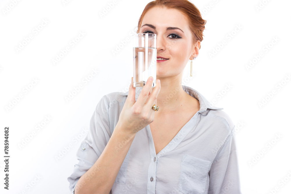 Happy young girl with a glass of water. Happy young girl with a glass of water.