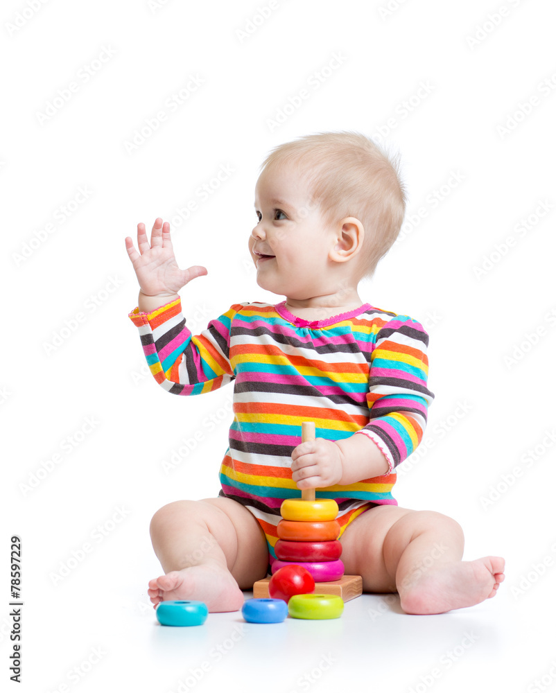 baby girl playing with pyramid toy baby girl playing with pyramid toy