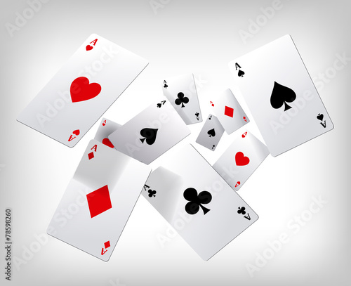 Playing cards. Poker aces flying insolated on gray background.