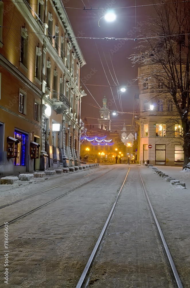 Obraz premium Beautiful winter cityscape in the center of old Lvov city at the