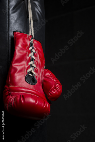 Red boxing glove with low key lighting © bhakpong