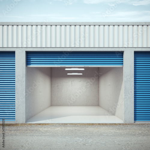 Obraz na plátně Empty storage unit with opened door
