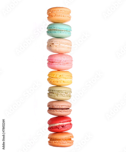 Colorful macaroons tower isolated on white photo