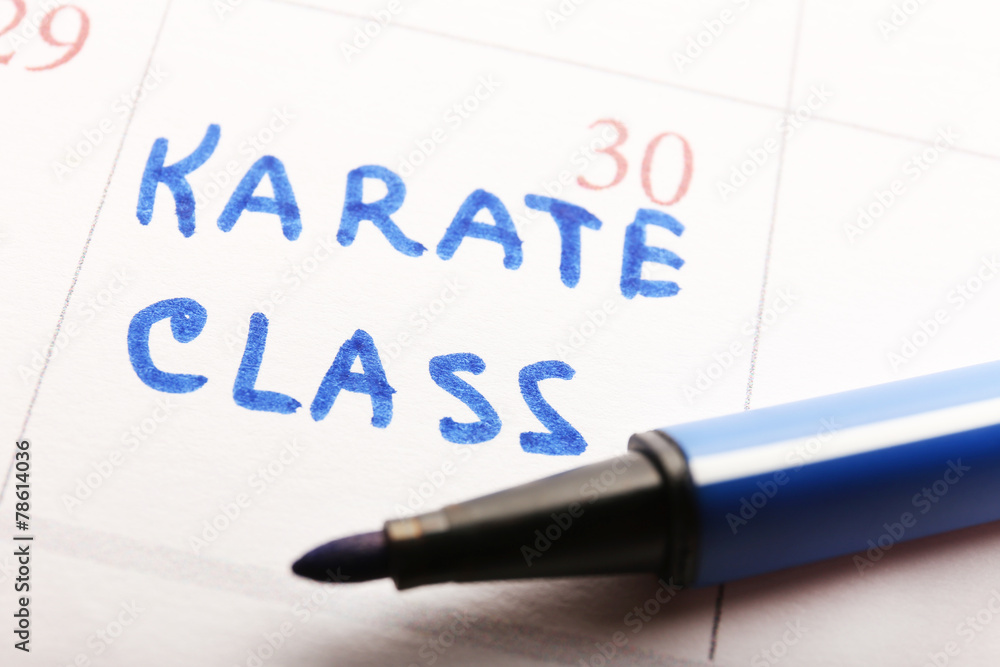 Written plan Karate Class on calendar page background Written plan Karate Class on calendar page background