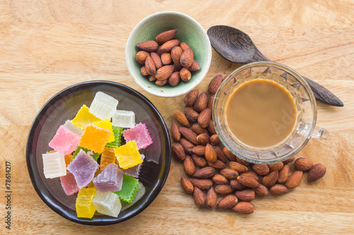Almonds,colorful dessert and hot coffee for healthy