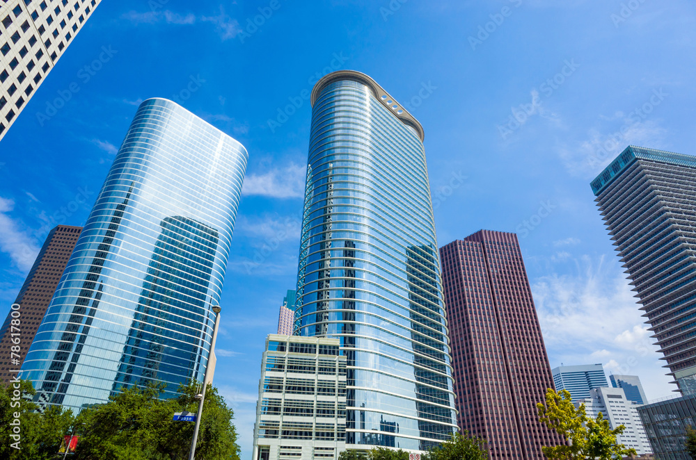 Skyscrapers against blue sky in downtown of Houston, Texas Skyscrapers against blue sky in downtown of Houston, Texas