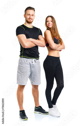 Athletic couple - man and woman after fitness exercise on the wh