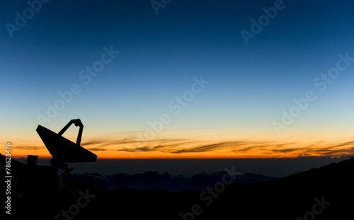 Radio telescope antenna at twilight. Hawaii. © marcel