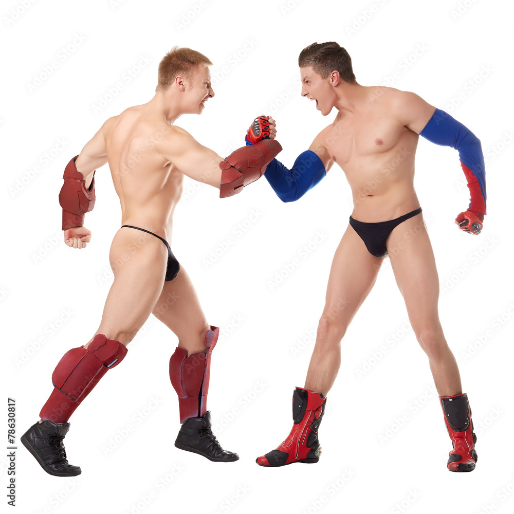 Image of seminude superheroes struggling in studio Image of seminude superheroes struggling in studio
