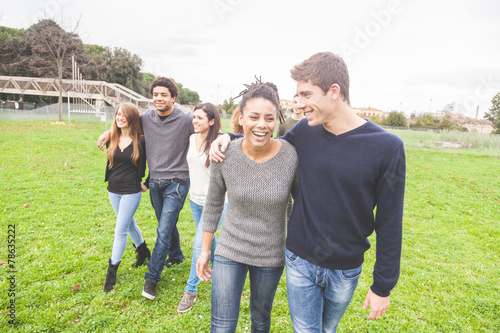 Multiethnic group of friends at park