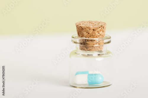 pills in glass jars