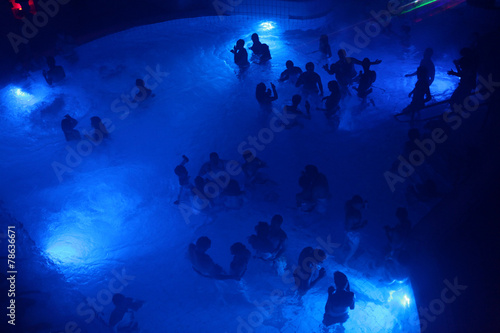 Night party in thermal bath in Budapest, Hungary.