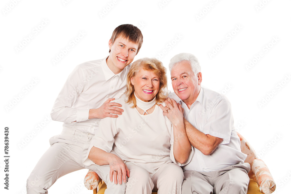 Happy smiling senior couple with son. Isolated on white