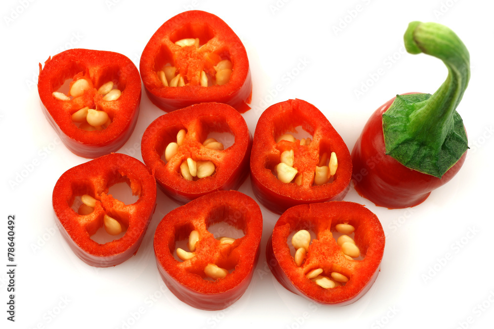 cut red hot chili pepper (Capsicum) on a white background cut red hot chili pepper (Capsicum) on a white background