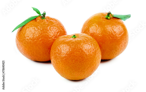 three ripe mandarins isolated on white background