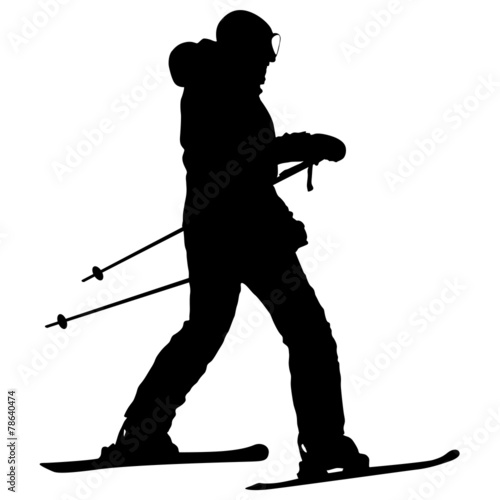Mountain skier  speeding down slope. Vector sport silhouette