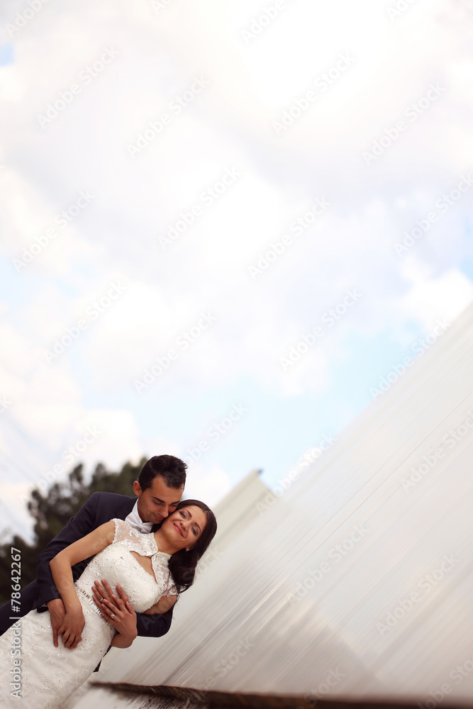 Bride and Groom posing outdors Bride and Groom posing outdors