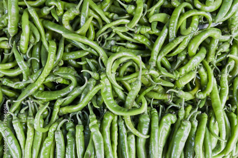 green spicy peppers close up green spicy peppers close up