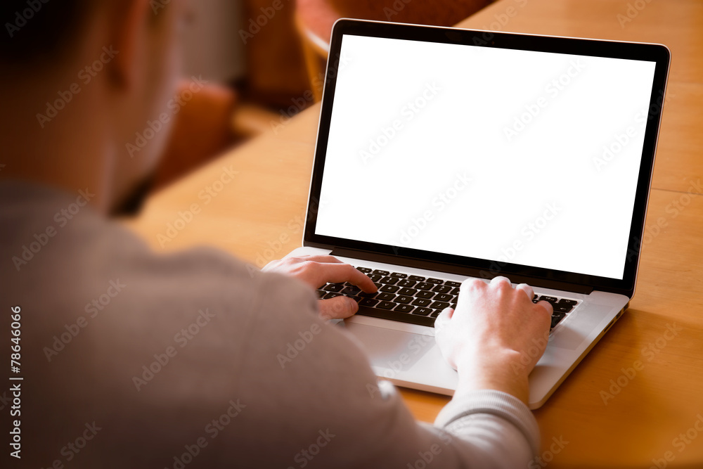 Man using, working on laptop with blank screen in home Man using, working on laptop with blank screen in home