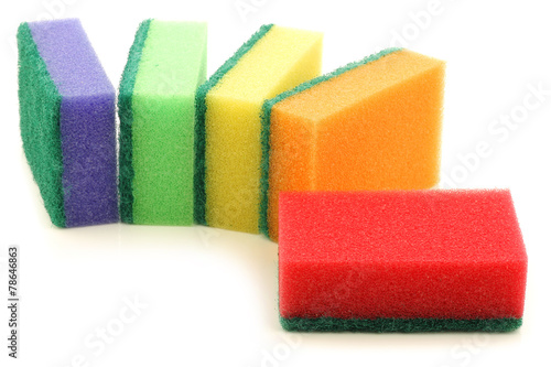 colorful abrasive pads on a white background