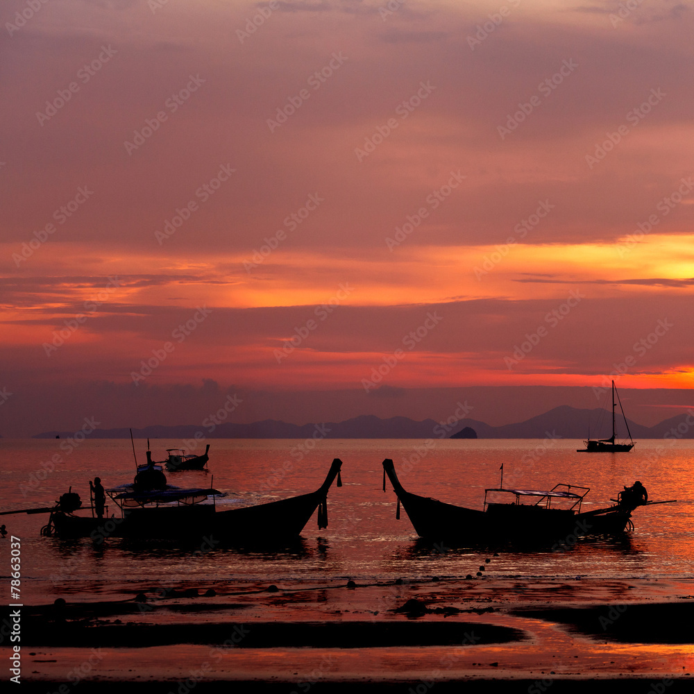 Sunset with boat in Thailand
