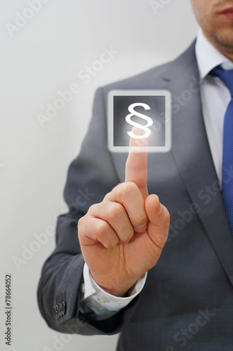 man pushes paragraph touchscreen