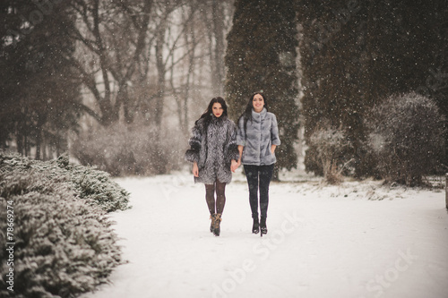 funny girls enjoying winter weather © Art_man
