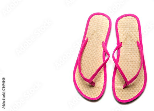 Pink and Straw flip-flop sandalw on a white background