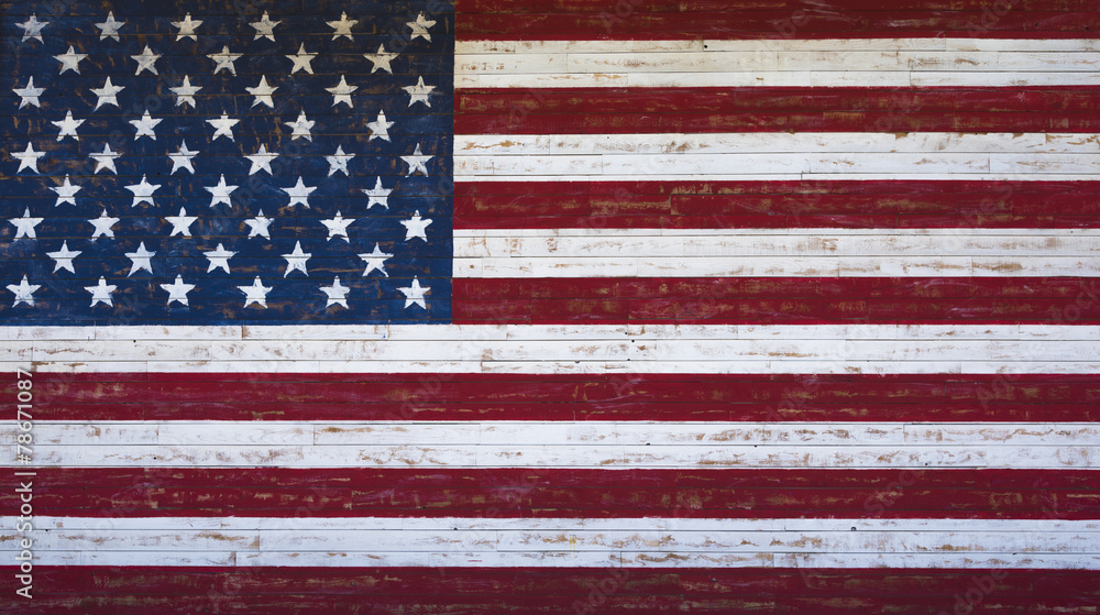 Fototapeta premium American or United States flag painted on a wooden plank wall