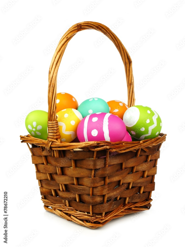Easter basket filled with colorful eggs Easter basket filled with colorful eggs