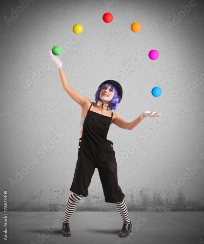 Obraz na plátne Clown like a juggler