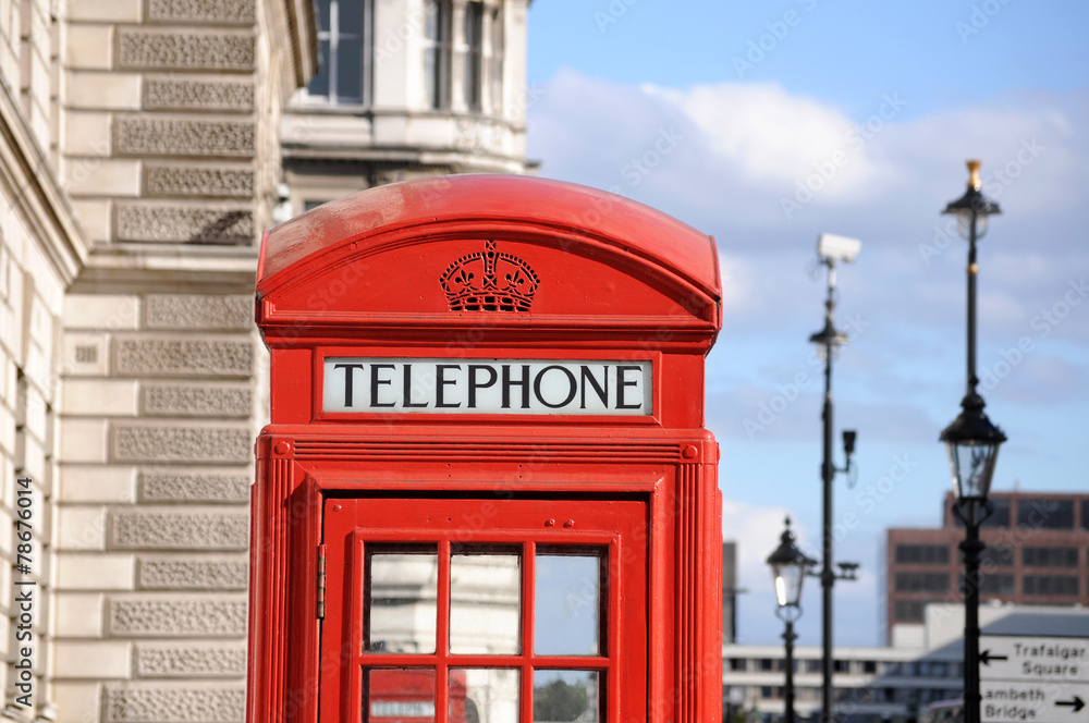 Red telephone box in London street Red telephone box in London street