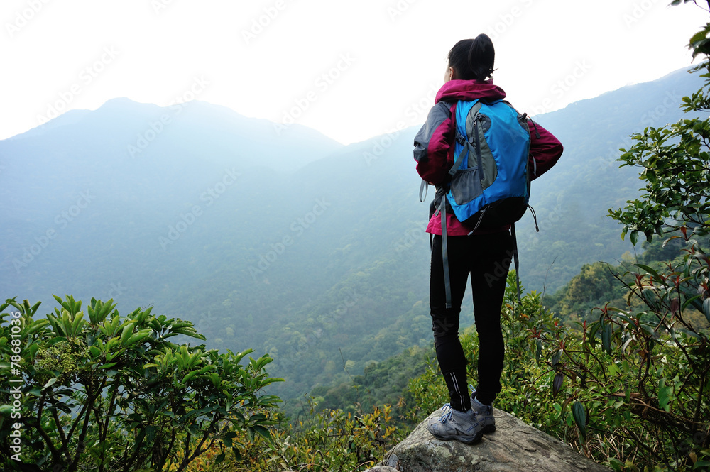  woman  hiker at mountain peak