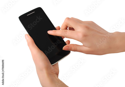 Cell Phone in woman's hands on white background. Close up.