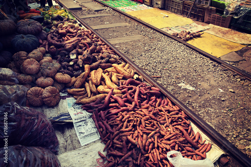 vegetable and fruits selling at maekong railway station market photo