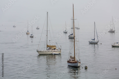Luxury Sailboats in Dense Fog