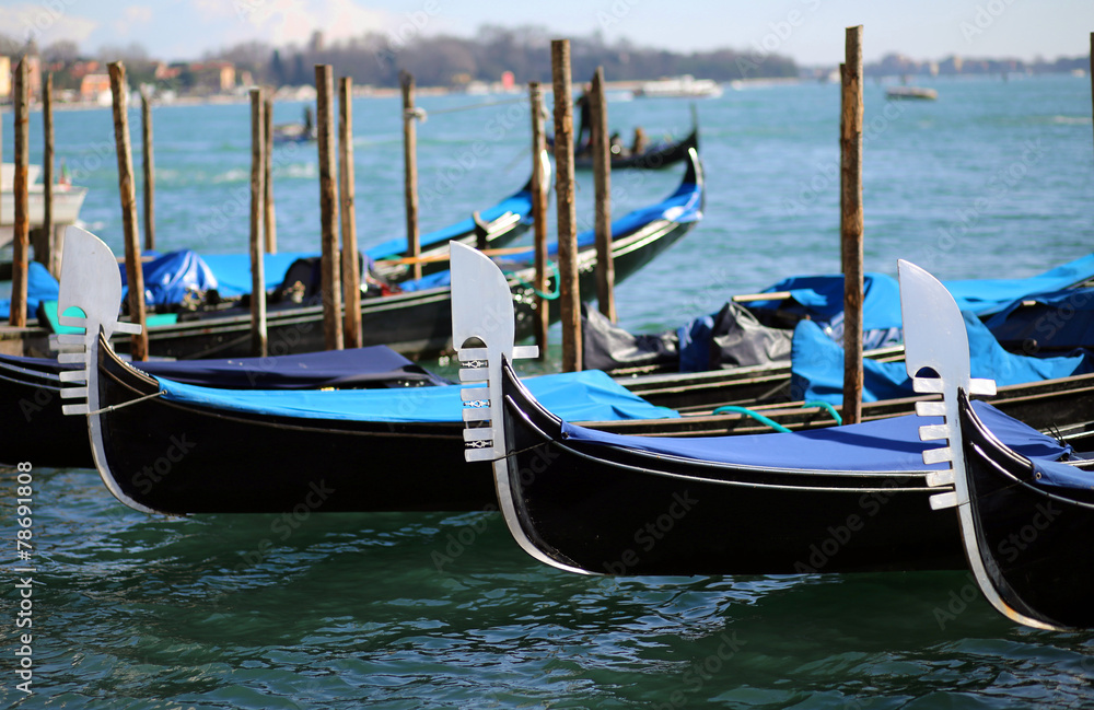 three gondolas near St. Mark's square in Venice
