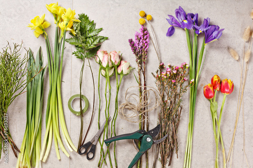 Fototapeta Naklejka Na Ścianę i Meble -  set of flowers for making bouquet with instrument
