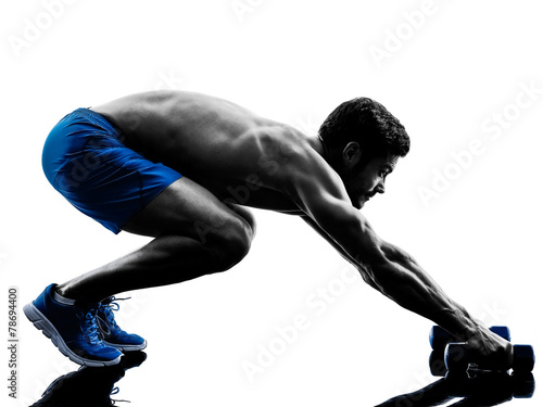 Fototapeta man exercising fitness crunches exercises silhouette