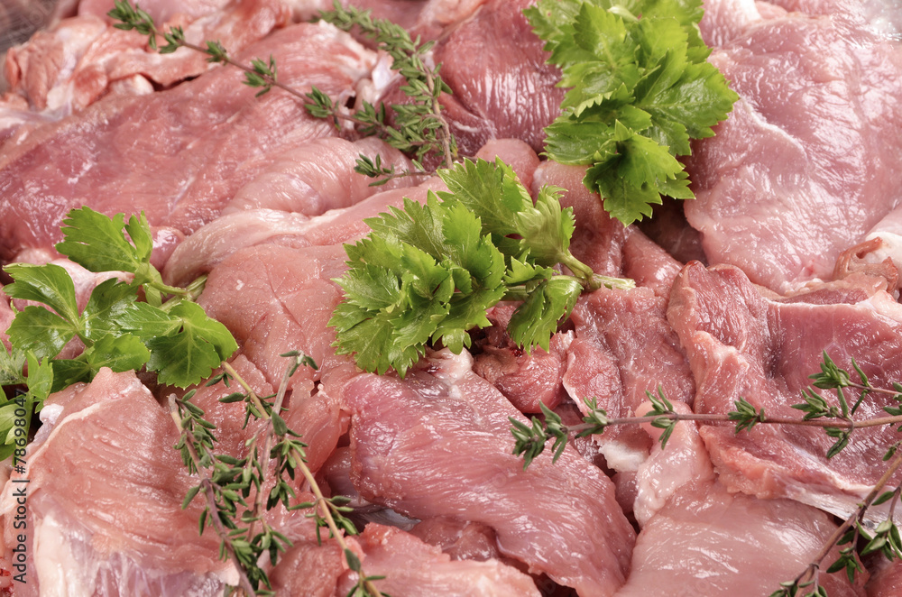Raw pork with fresh spices close-up.. Raw pork with fresh spices close-up..