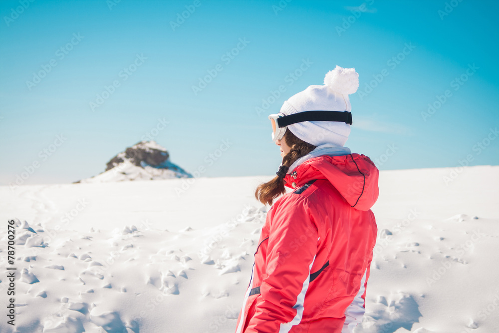 Woman skier on snow