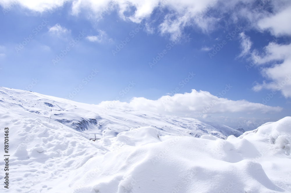 Plakat Panorama of Snow Mountain Range Landscape with Blue Sky