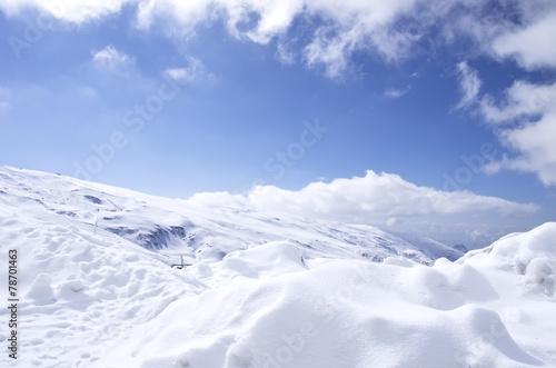 Panorama of Snow Mountain Range Landscape with Blue Sky © inacio pires