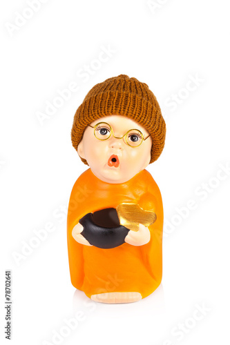 ceramic monk doll isolated on white background