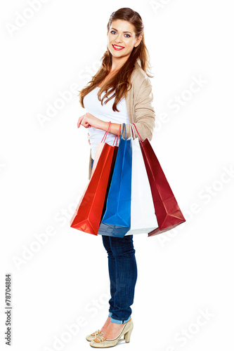 Fashion model with shopping bag. Isolated white background full © Yuriy Shevtsov