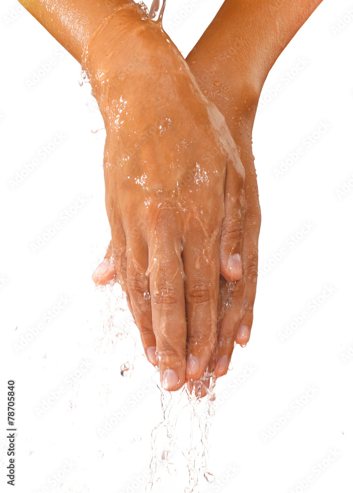 Fototapeta premium Close-up of female hands in oil and pouring water