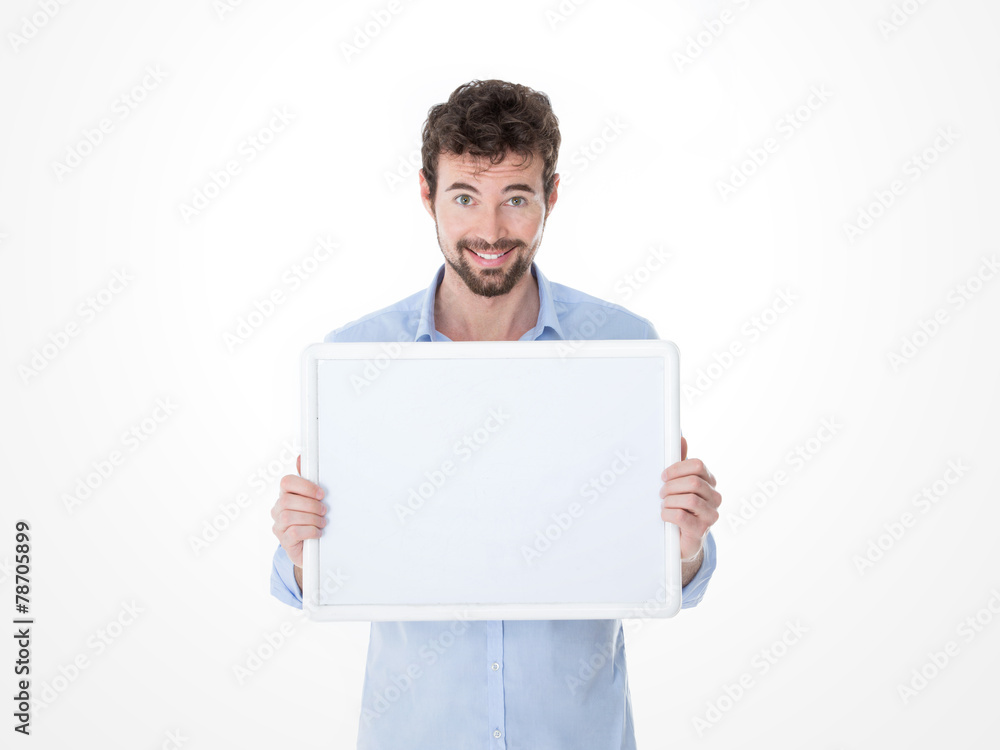 smiling young man holding an empty board smiling young man holding an empty board