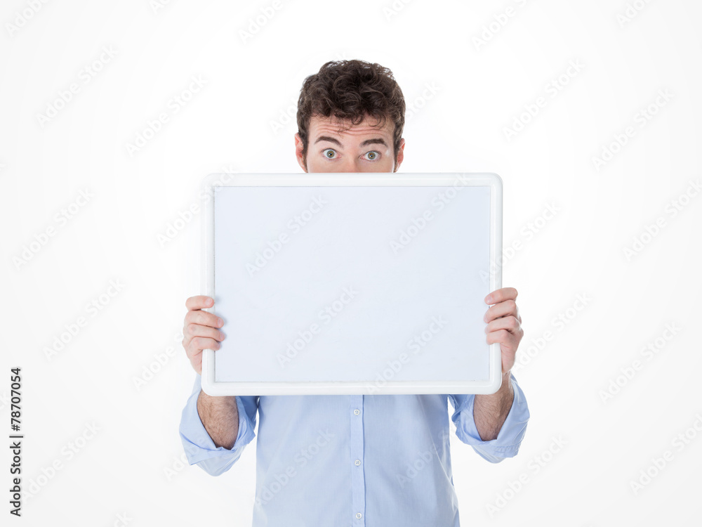 young man with half face cover by an empty board young man with half face cover by an empty board