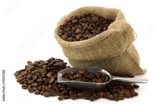coffee beans in a burlap bag on a white background