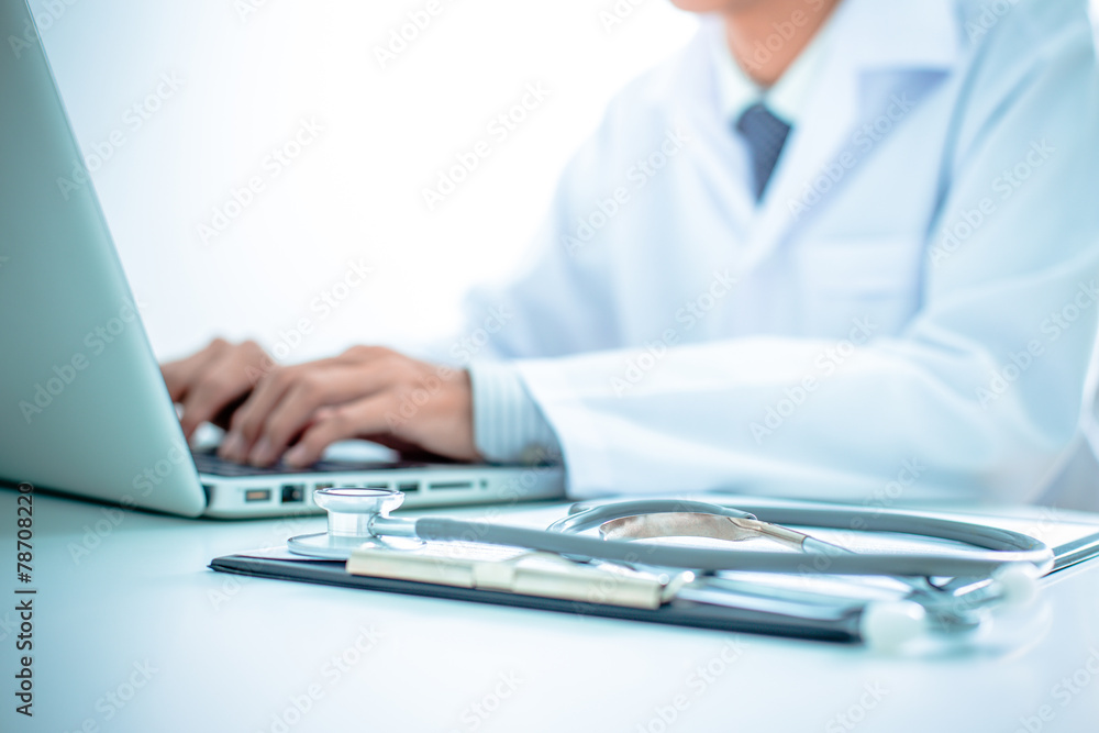 Close-up of a medical worker with laptop Close-up of a medical worker with laptop